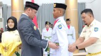 Bupati Adnan Kukuhkan 70 Anggota Paskibraka, Harap Sukses Kibarkan Bendera HUT RI Ke-79