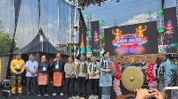 Kemenkum Serahkan Sertifikat KIK dan Piagam KBKI di Festival Pacu Jalur 2025