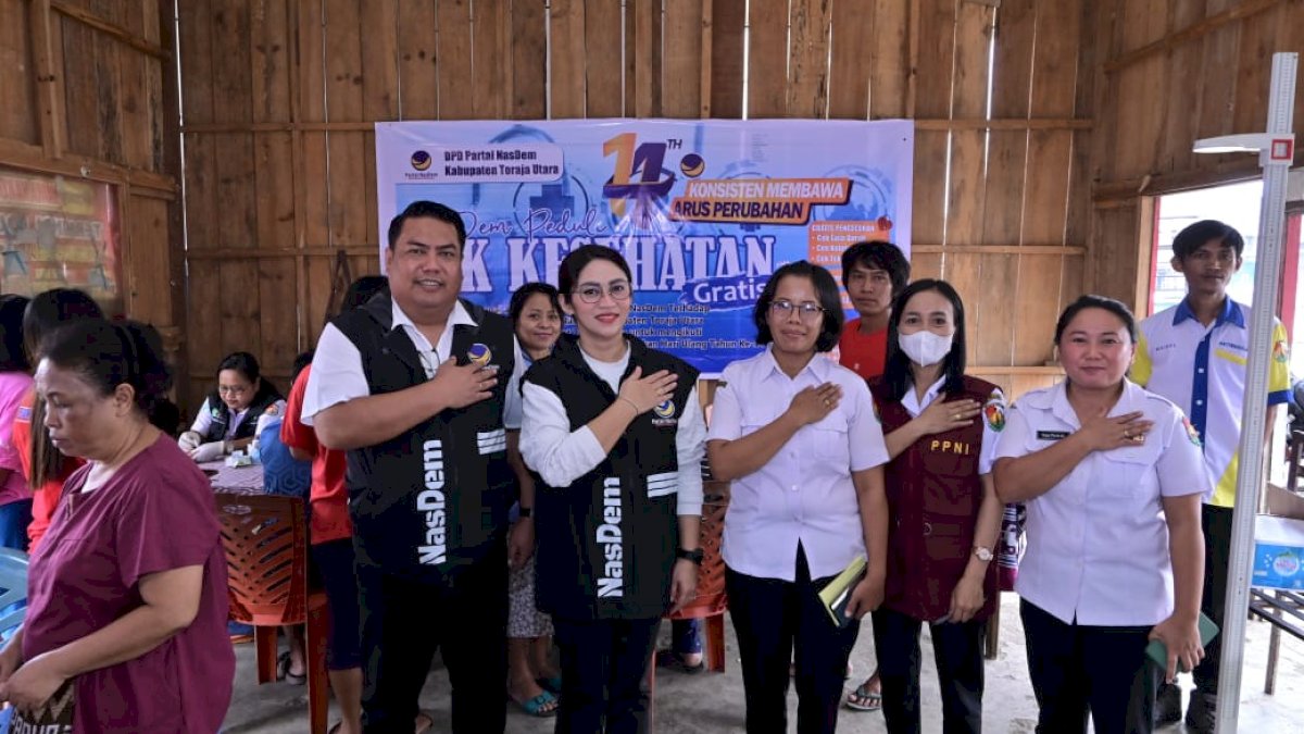 Peringati HUT Ke-14, Nasdem Torut Gelar Cek Kesehatan Gratis dan Berbagi Sembako