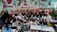 Peringati HUT ke-26, DWP Kanwil Kemenkum Sulsel Gelar Bakti Sosial di Sekolah