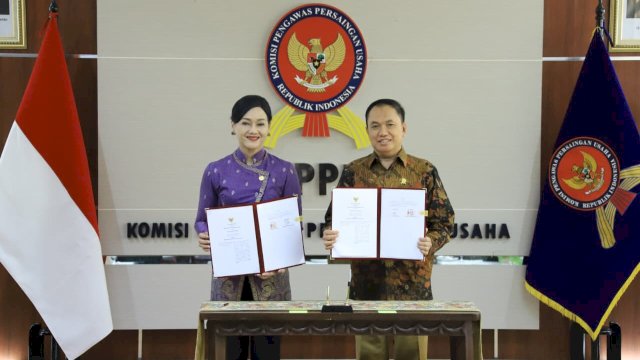 Sinergi OJK bersama KPPU menjaga persaingan usaha di industri jasa keuangan. Foto: Istimewa.